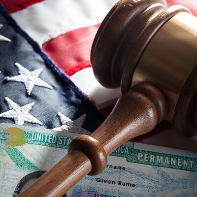 Green card with flag and gavel